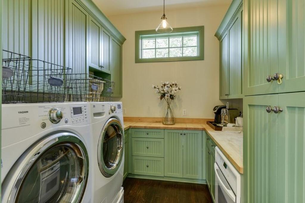 laundry room turned funtional pantry by konen homes after